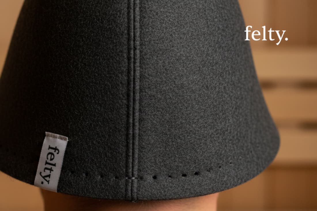This close-up of a custom sauna hat showcases the plush, insulating material and thoughtful design features that can enhance the comfort and relaxation of a sauna session.