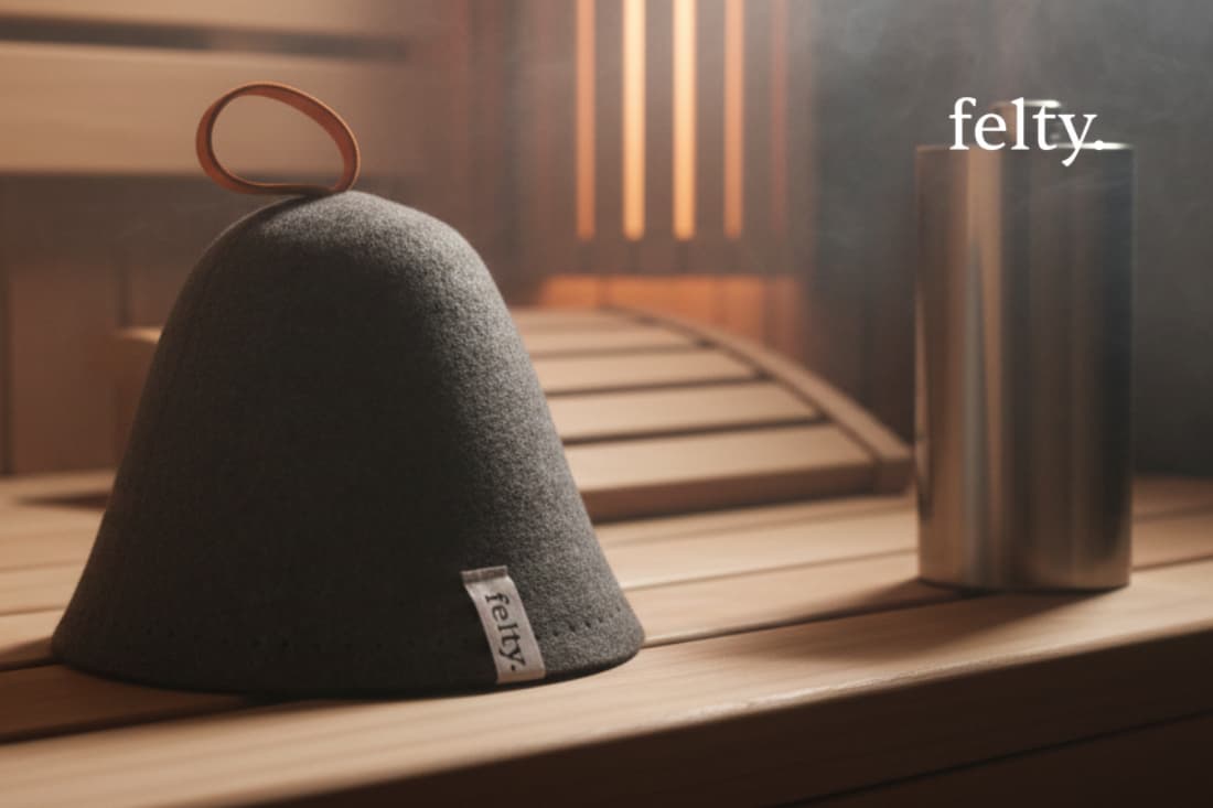 Prominent display of a premium felt sauna hat, highlighting the top-rated products designed with the discerning male consumer in mind.