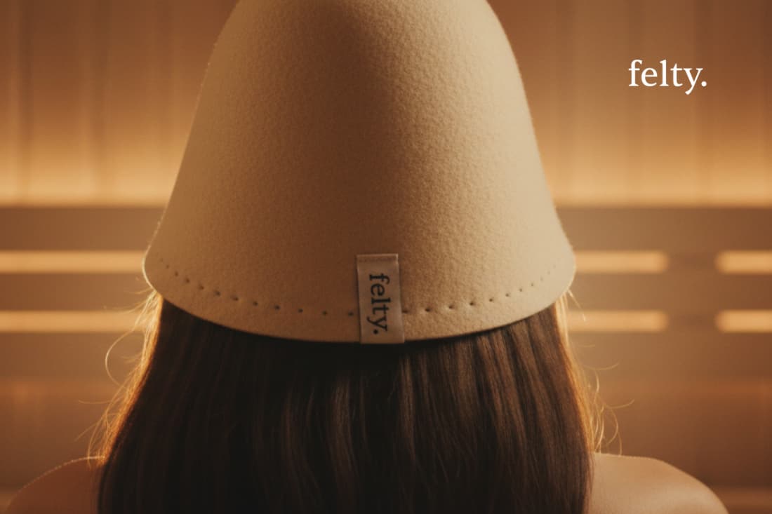 This image showcases the insulating, form-fitting design of a custom sauna hat, highlighting its ability to provide warmth and comfort during a relaxing wellness session.